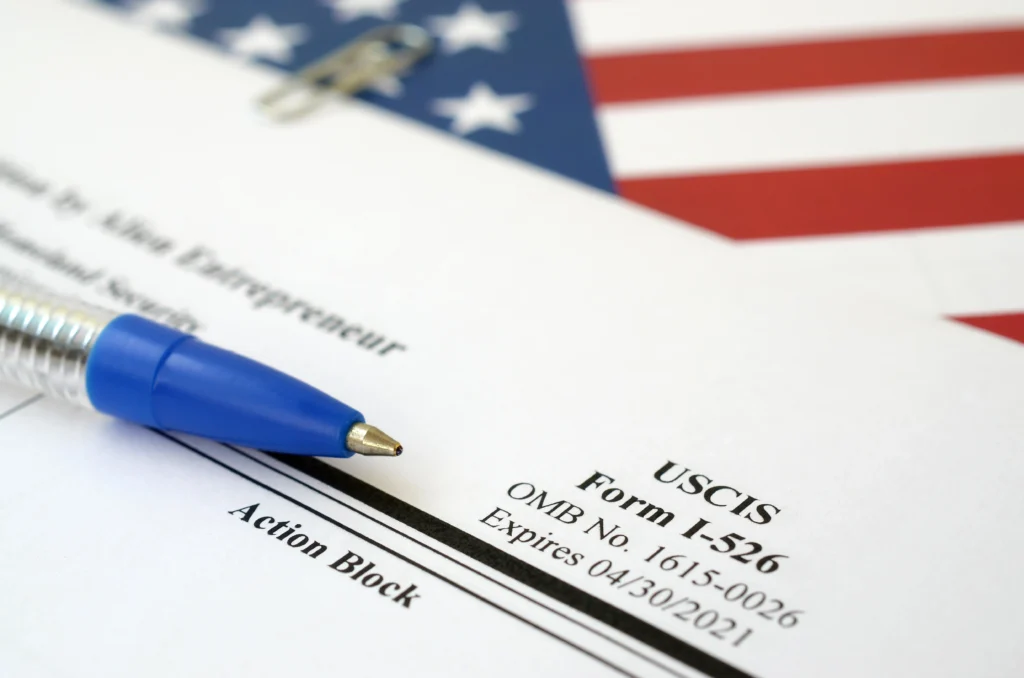 Immigration attorney reviewing USCIS Request for Evidence RFE letter for I-130 petition delay