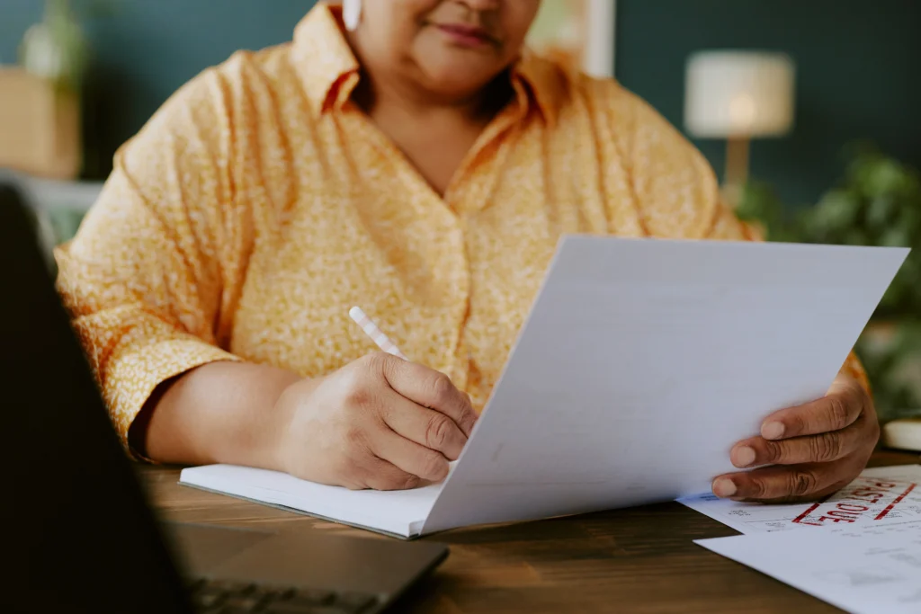 Permanent resident completing Form I-90 green card renewal using the green card number