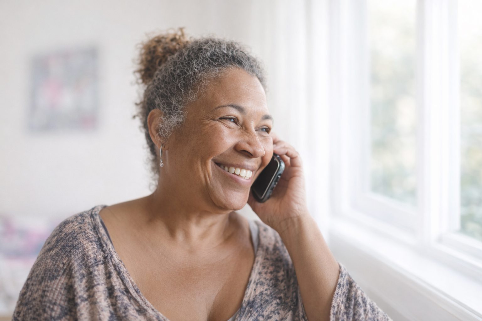 older immigrant learns over the phone that their removal order has been cancelled