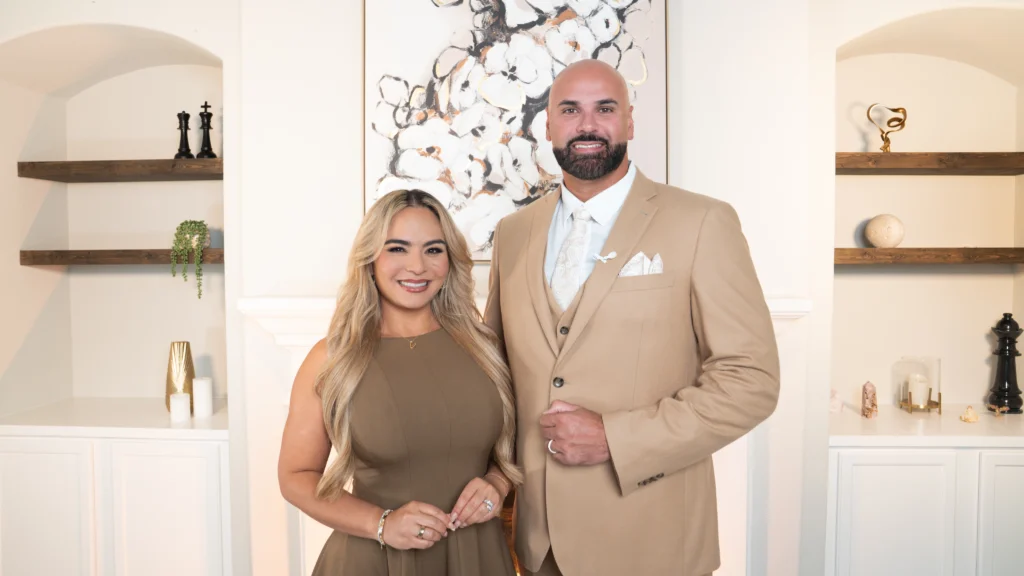 Alonso & Alonso immigration attorneys smiling in a professional office setting, representing the FAQ and legal support section for clients seeking answers to their cases.